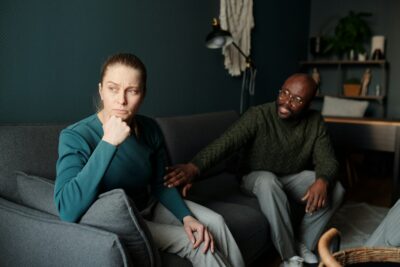 A couple appears to be having a serious conversation.