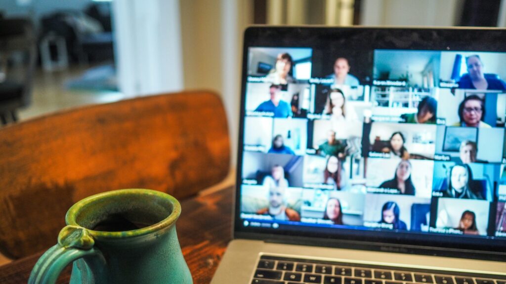 macbook pro displaying group of people