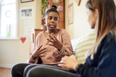 Woman talking about self-harm to friend